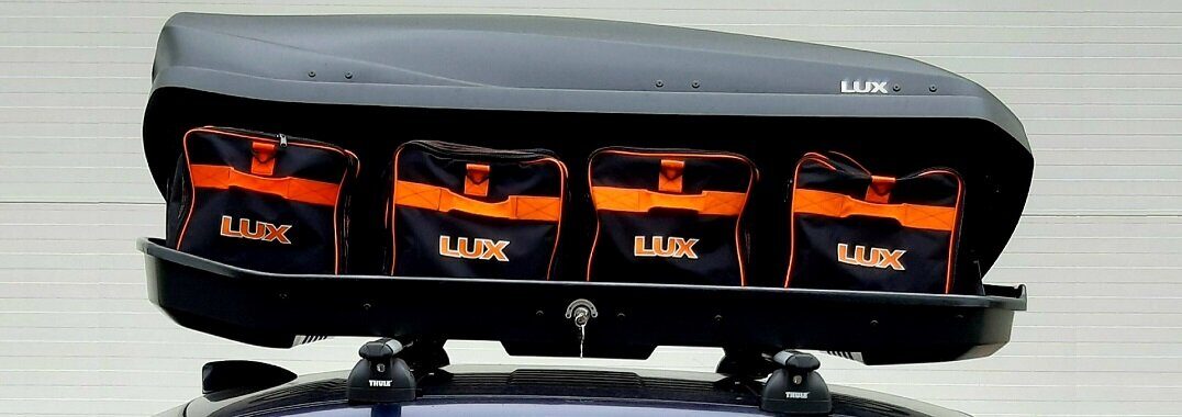Только в нашем магазине при покупке автомобильного бокса LUX любой модели - одна фирменная сумка LUX в подарок!